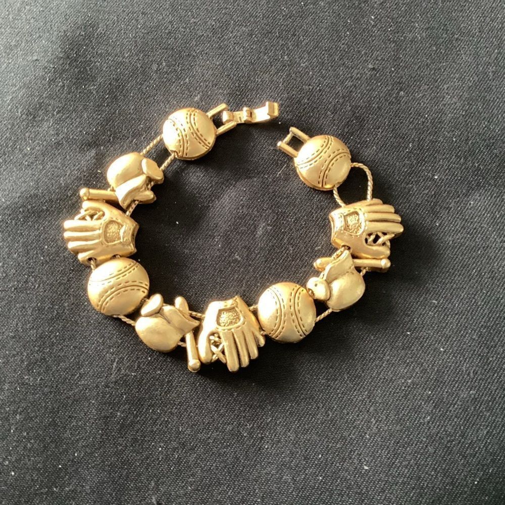 Gold toneย baseball charmโbracelet. J0100